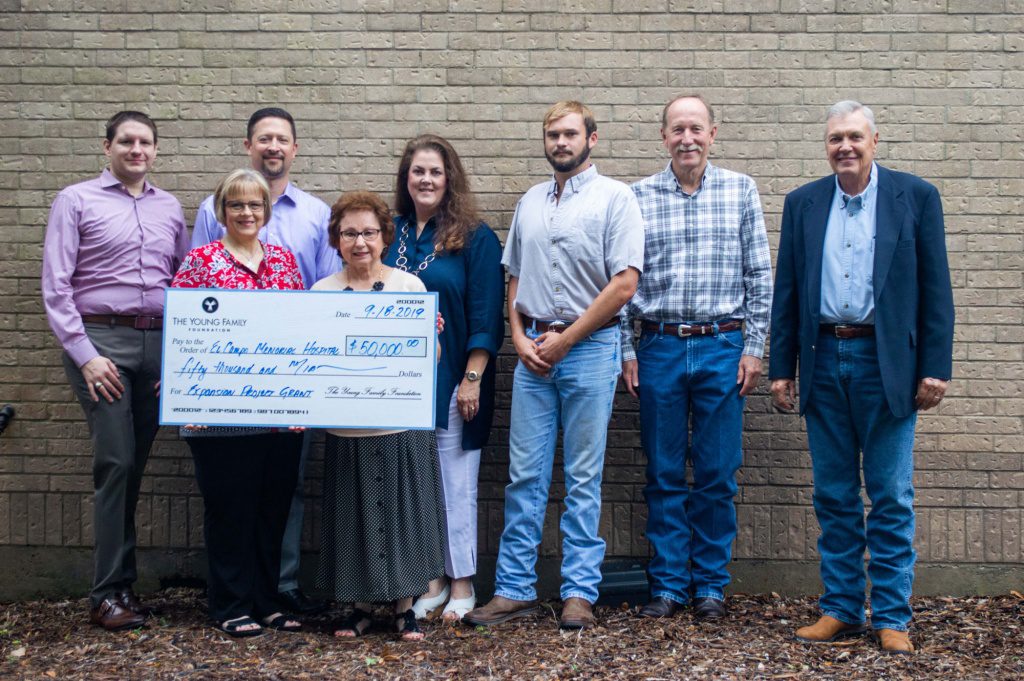 rural telecommunications provider presents check to local hospital
